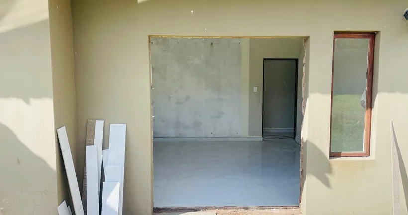 New-build interior with aluminium window and door openings complete